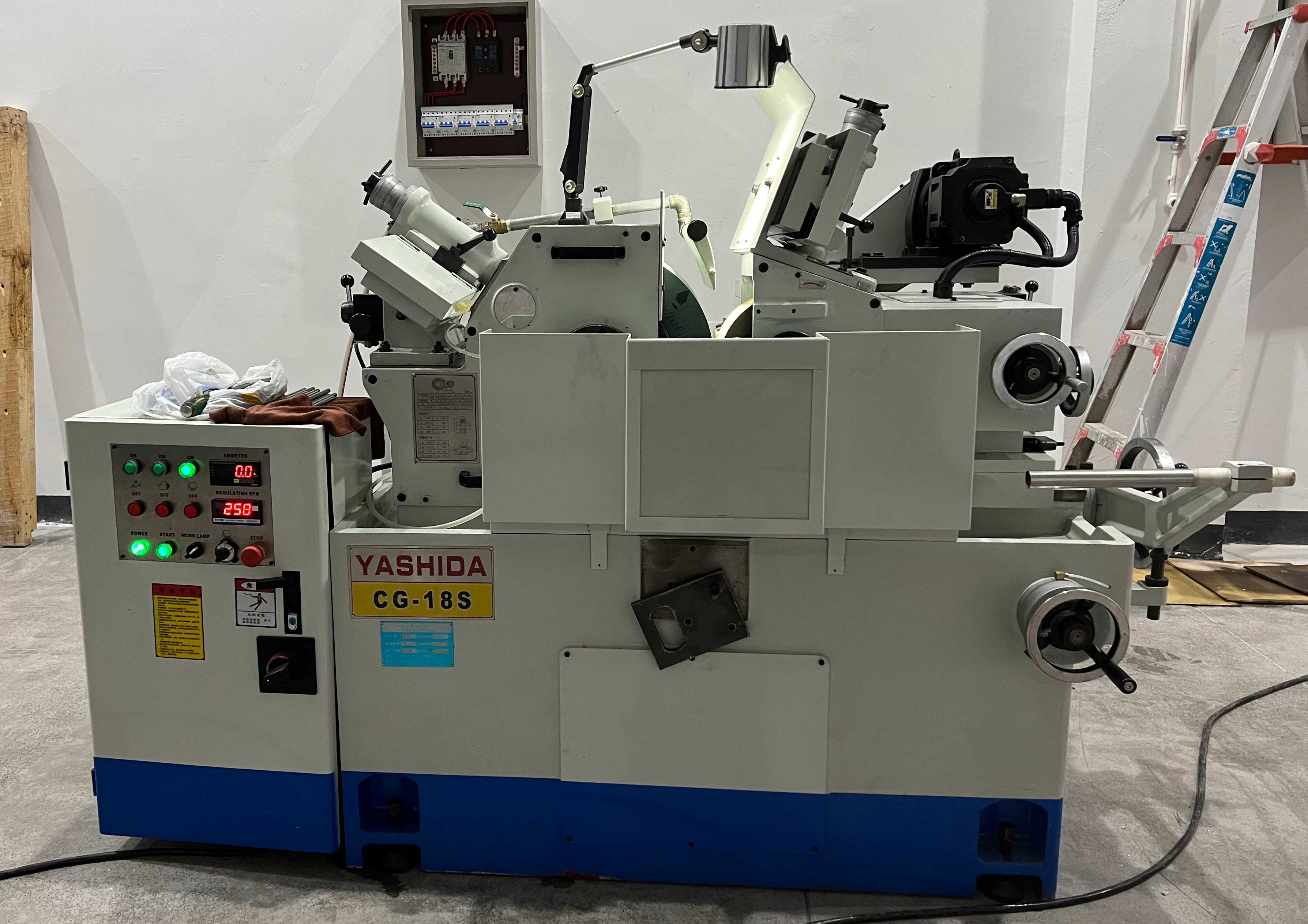 無心磨床怎么實現自動上下料